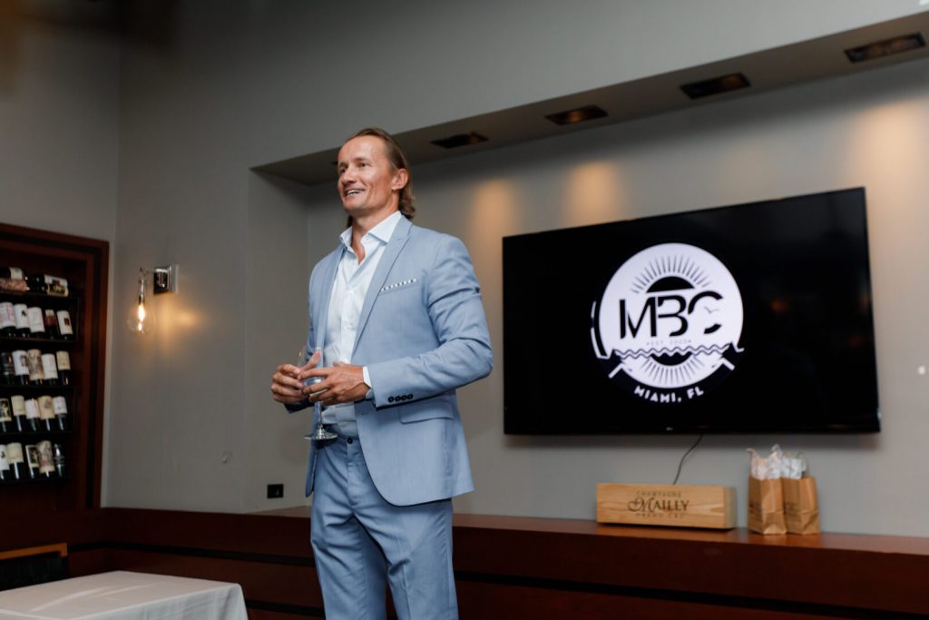 Stefan Lingmerth speaking at the MBC event at Fogo de Chao in the SoFi neighborhood of Miami Beach
